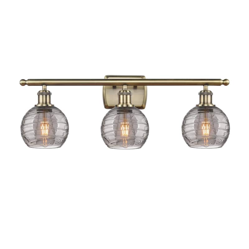 Innovations Lighting 516-3W-10-26-Athens Deco Swirl-Vanity Light - Antique Brass / Light Smoke Deco Swirl