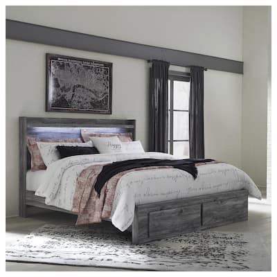Baystorm Weathered Gray Panel Bed with Footboard Storage Drawers