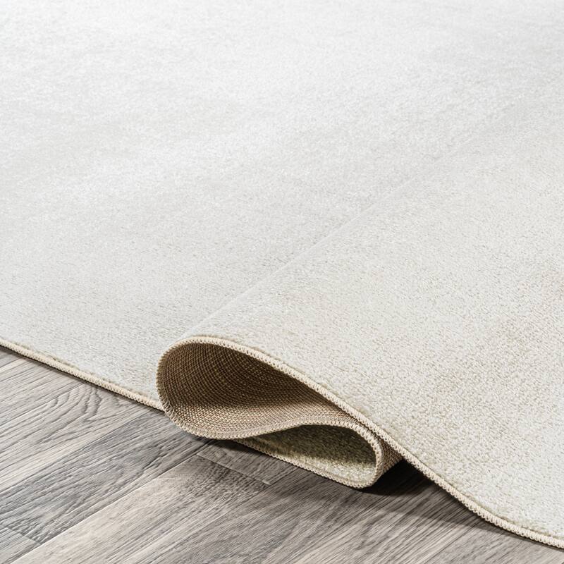 JONATHAN Y Fawning Classic Solid Low-Pile Machine-Washable Terra Area Rug