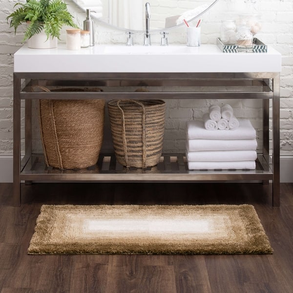 https://ak1.ostkcdn.com/images/products/is/images/direct/1843557f00bc55b90595c791405ca806b34ee7cf/Mohawk-Home-Ombre-Border-Bath-Rug.jpg?impolicy=medium