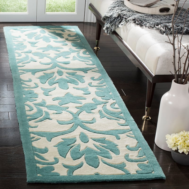 SAFAVIEH Handmade Modern Art Candelaria Modern Polyester Rug - 2'3" x 8' Runner - Ivory/Light Blue