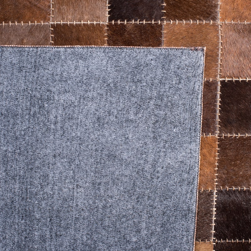 SAFAVIEH Handmade Studio Leather Luciana Natural Hide Leather Rug