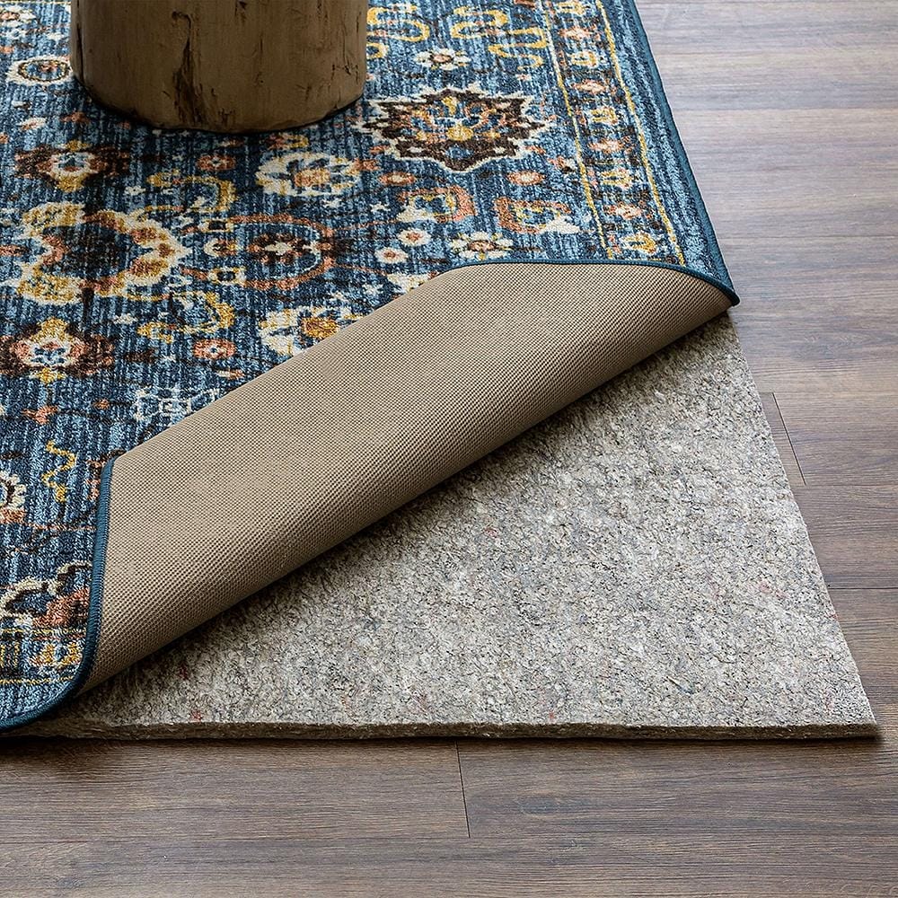 https://ak1.ostkcdn.com/images/products/is/images/direct/1861c50526c24fca82e4e8f4baeb48ed253ec666/Mohawk-Home-Premium-Felted-Dual-Surface-Rug-Pad-1-2-Inch-Thick.jpg