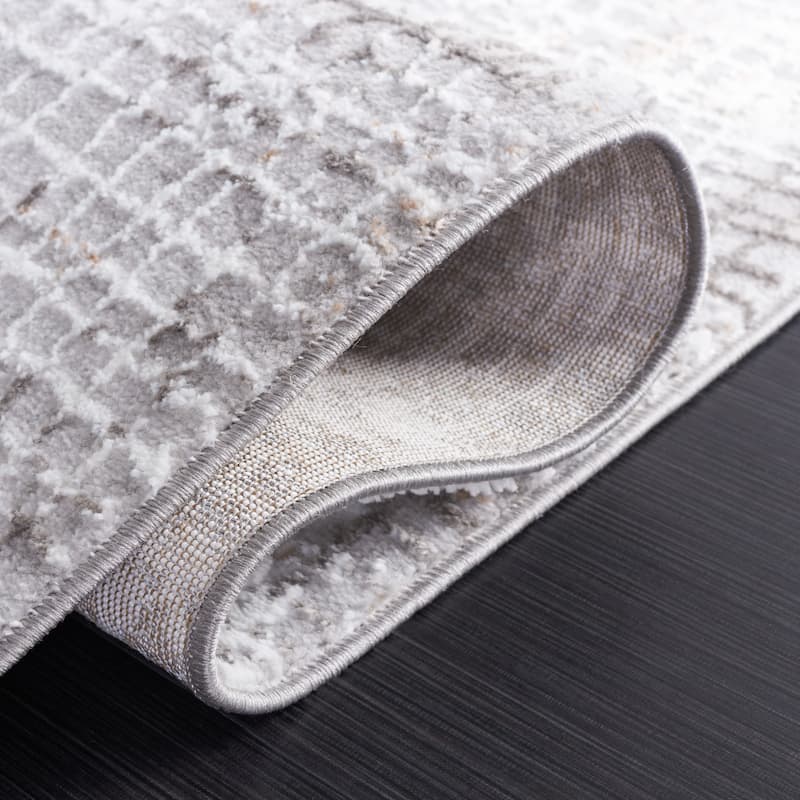 SAFAVIEH Parker Basra Modern Abstract Rug.