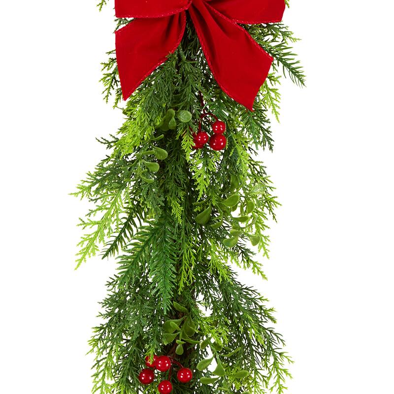 National Tree Company 6 ft. Artificial Feel Real Christmas Classic Garland with Red Berries, Cypress Tips, and a Red Bow - 6 ft