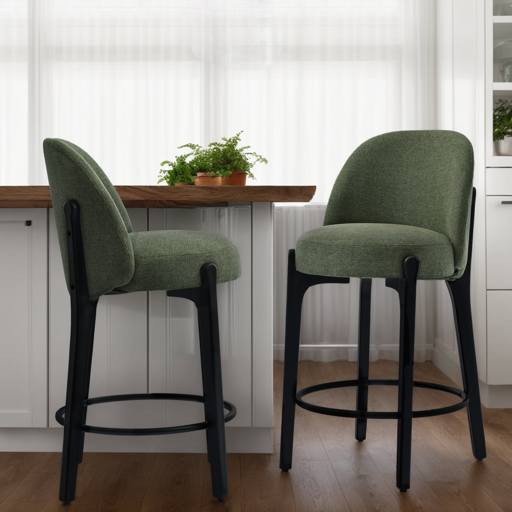 Upholstered Counter Height Bar Stools with wood legs.