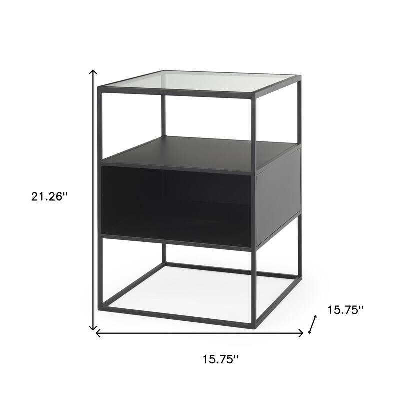 HomeRoots 21" Clear and Black Glass and Metal Square Frame End Table With Two Shelves - 15.75 in. x 21.26 in. x 15.75 in.