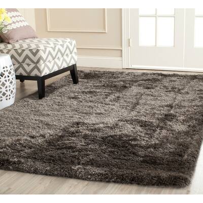 SAFAVIEH Handmade South Beach Leonella Shag Solid Polyester Rug