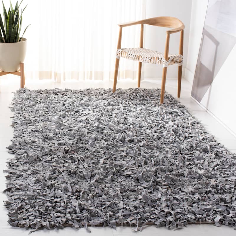 SAFAVIEH Handmade Leather Shag Carlijn Modern Leather Rug