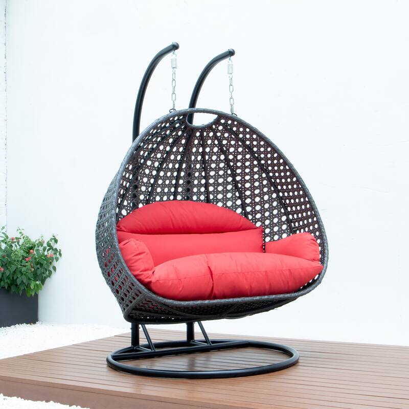 LeisureMod 2-Person Hanging Egg Swing Chair with Metal Stand - Handcrafted Charcoal Wicker, Patio Hammock Lounger with Cushions