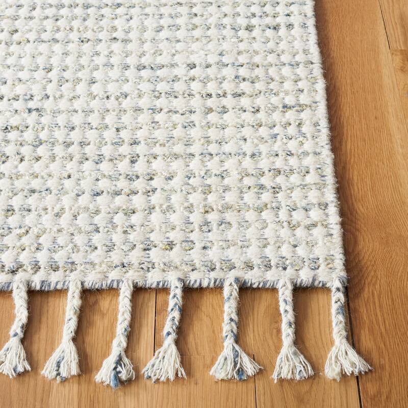 SAFAVIEH Handmade Casablanca Shag Ritsuko Wool Tassel Rug