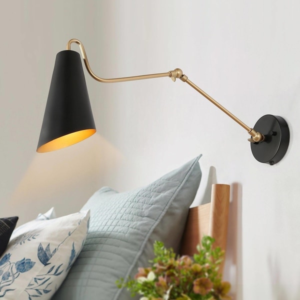 Gold swing arm wall sconce top