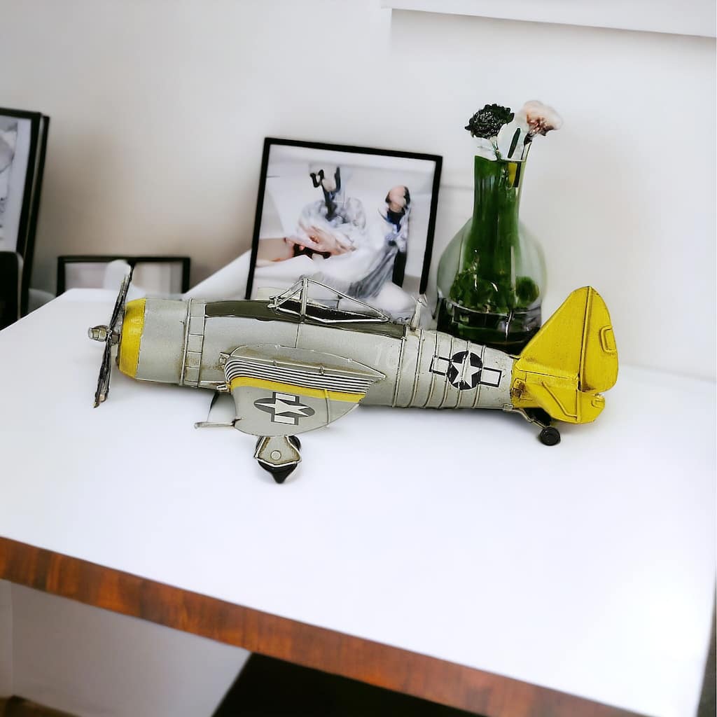 HomeRoots 4" Yellow and Gray Metal Hand Painted P-47D Thunderbolt Model Airplane - 14' X '3.75' X '12.25