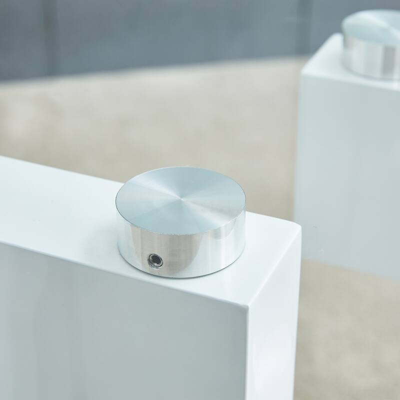 A rectangular modern and fashionable coffee table with tempered glass tabletop and white MDF legs. Suitable for living r