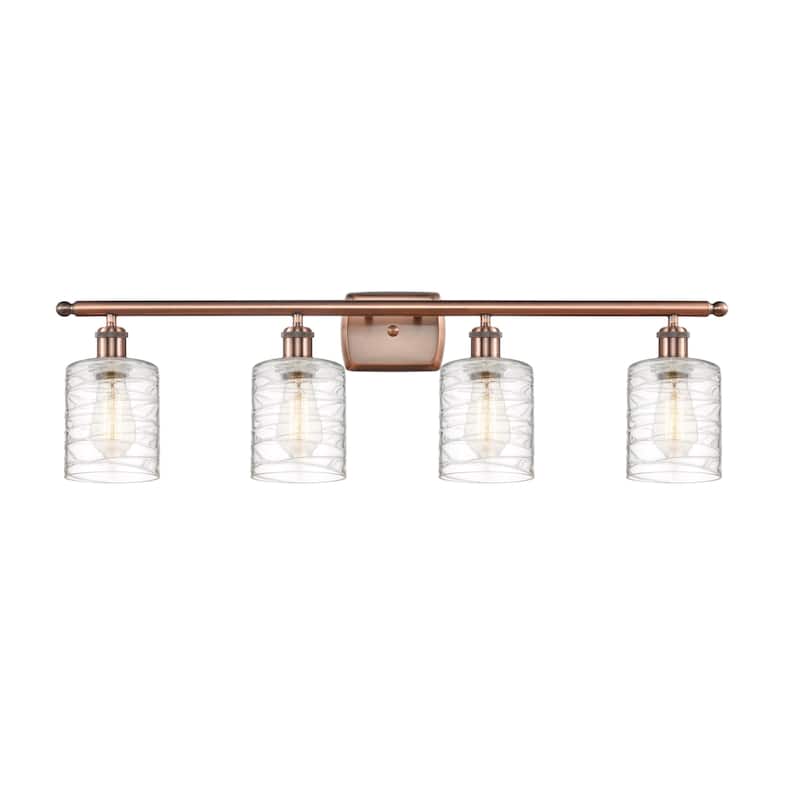 Innovations Lighting 516-4W-11-36 Cobbleskill Vanity Cobbleskill 4 - Antique Copper / Deco Swirl