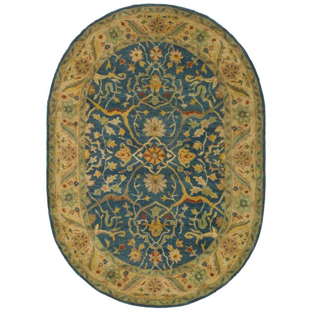 SAFAVIEH Handmade Antiquity Izora Traditional Oriental Wool Rug - 4'6" x 6'6" Oval - Blue