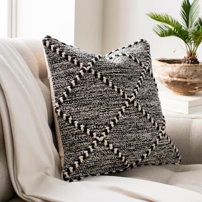 The Curated Nomad Pyrola Handwoven Black and White Boho Throw Pillow
