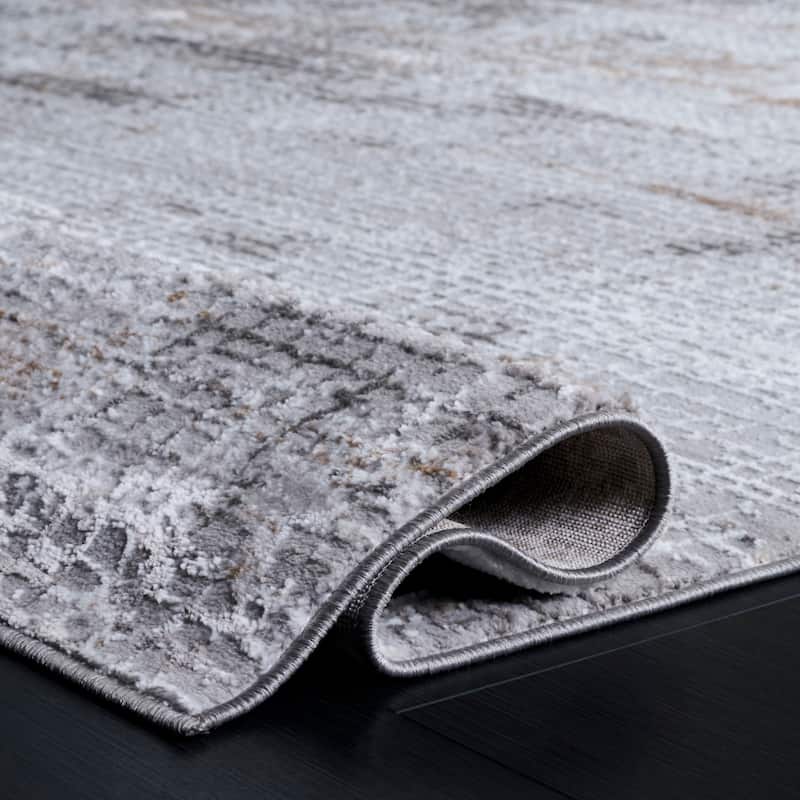 SAFAVIEH Parker Basra Modern Abstract Rug.