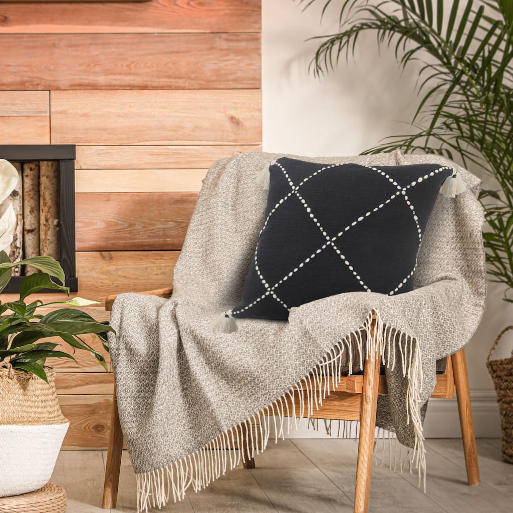 Sevita Black and White Geometric Tasseled Throw Pillow