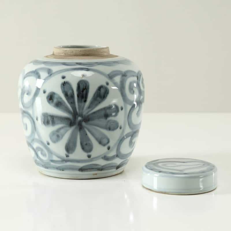 Approx.7 Inches Subtle Blue and White Round Jar with Floral Motif