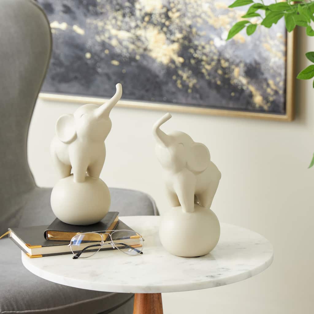 White Ceramic Trumpeting Elephant Decorative Sculpture with Round Base (Set of 2)