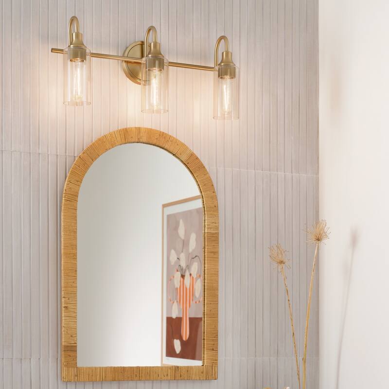 Kichler Lighting Kavi 23" 3-Light Vanity Light with Clear Glass in Champagne Bronze