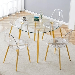 A modern minimalist style round transparent tempered glass table with ...