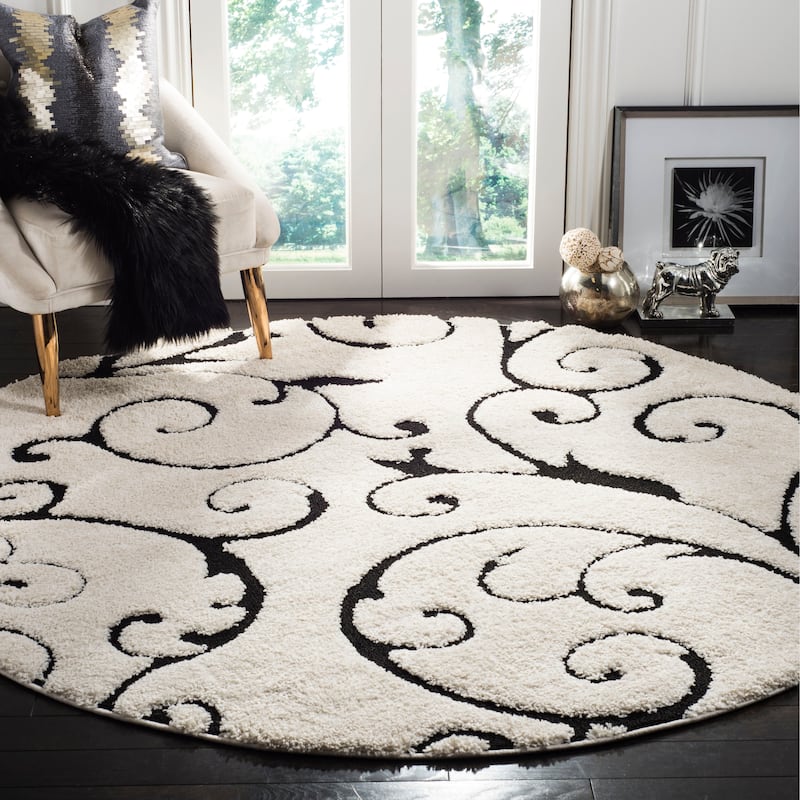 SAFAVIEH Florida Shag Shahin Scroll 1.2-inch Thick Textured Rug - 6'7" Round - Ivory/Black