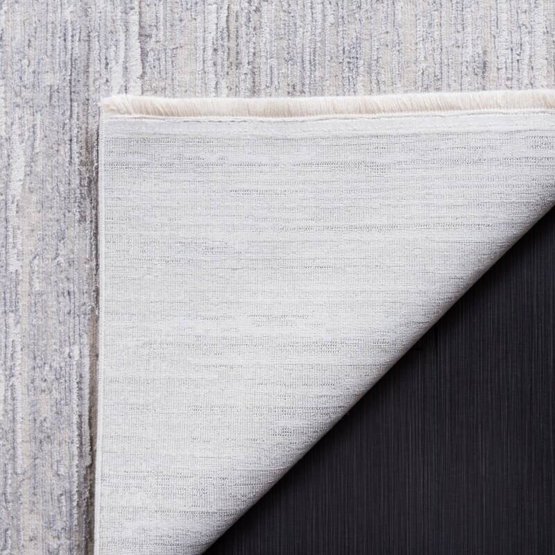 SAFAVIEH Diamond Einfrid Modern Abstract Fringe Rug