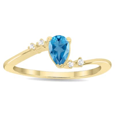 Women's Pear Shaped Blue Topaz and Diamond Wave Ring in 10K Yellow Gold
