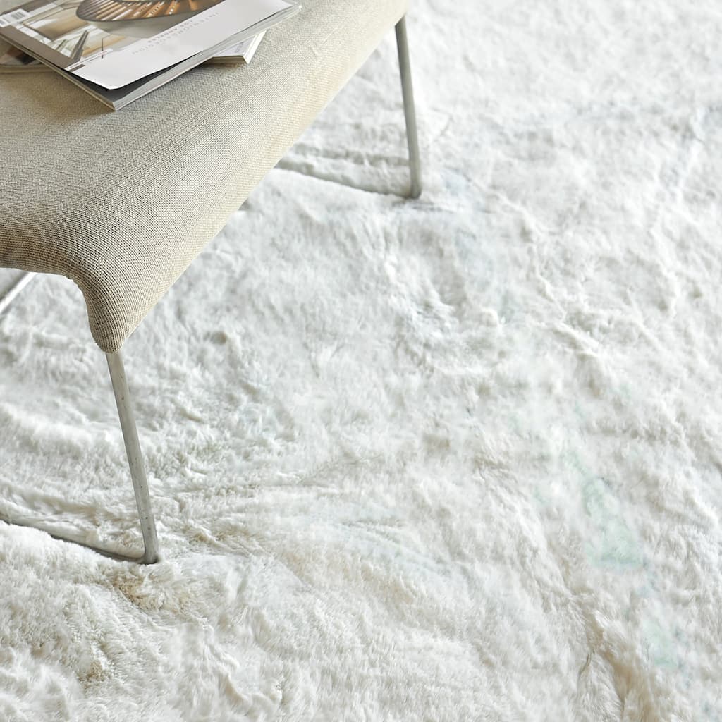 EXQUISITE RUGS Hand-stitched Polyacrylic Ivory Area Rug.