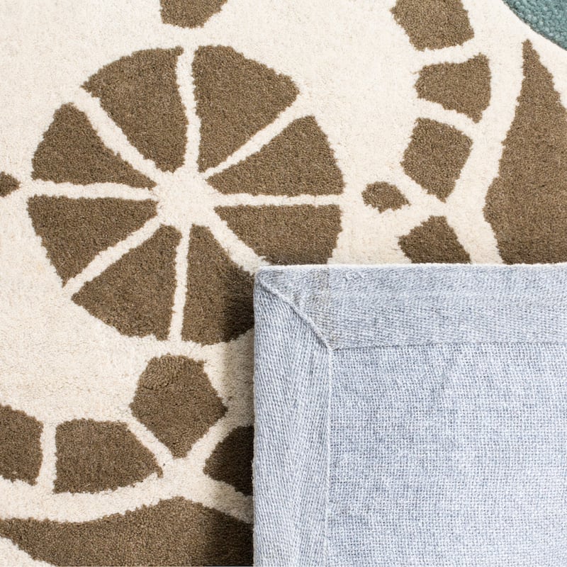 SAFAVIEH Handmade Capri Hilkaa Modern Wool Rug