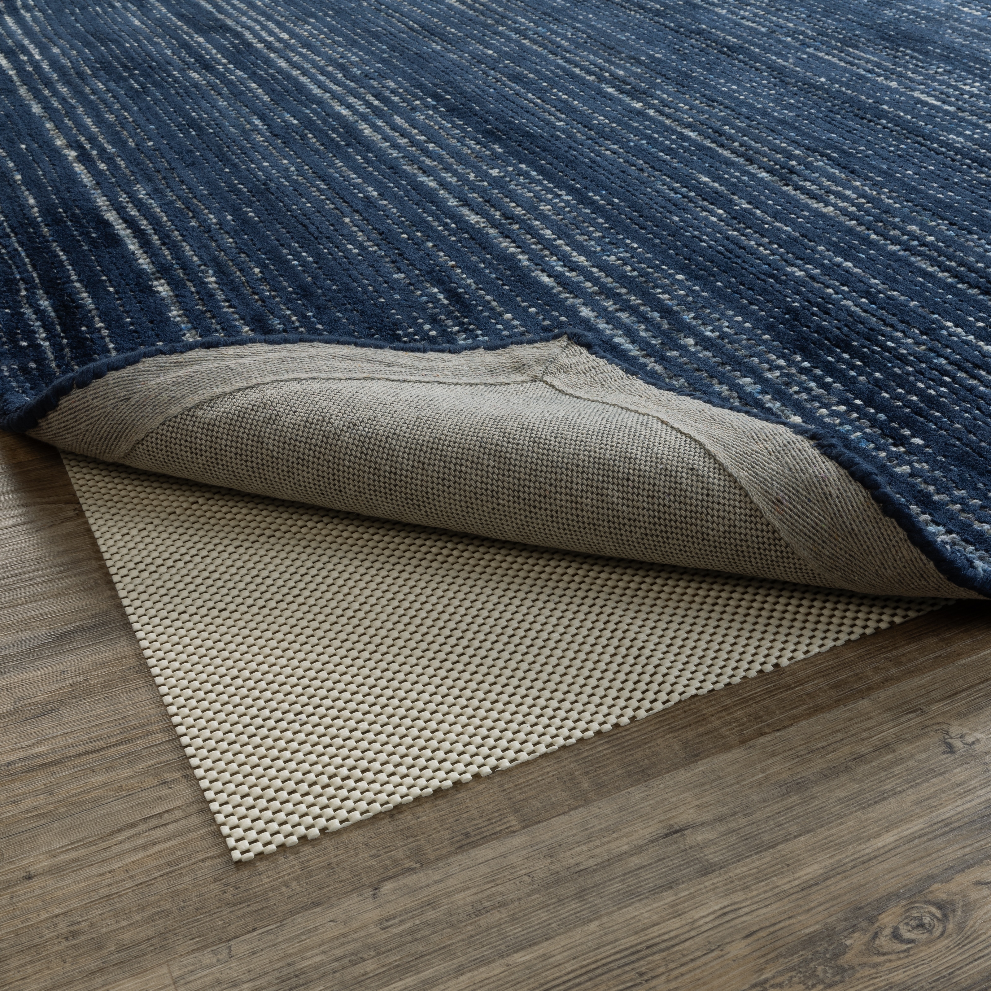 Style Haven Plush Hold White PVC-Coated Knit Polyester Rug Pad - Beige