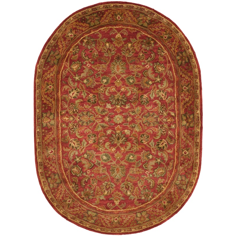 SAFAVIEH Handmade Antiquity Manerva Traditional Oriental Wool Rug - 4'6" x 6'6" Oval - Red/Red