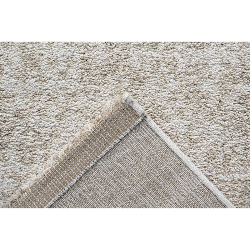 Matilda Ivory and Beige Polypropylene Area Rug - 9' x 12'