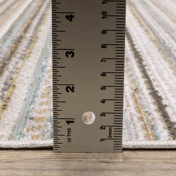 Cavett Textural Geometric Striped Beige/ Multi Area Rug