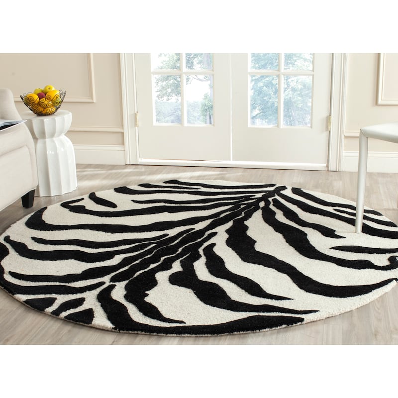 SAFAVIEH Handmade Cambridge Rikey Animal Print Wool Rug