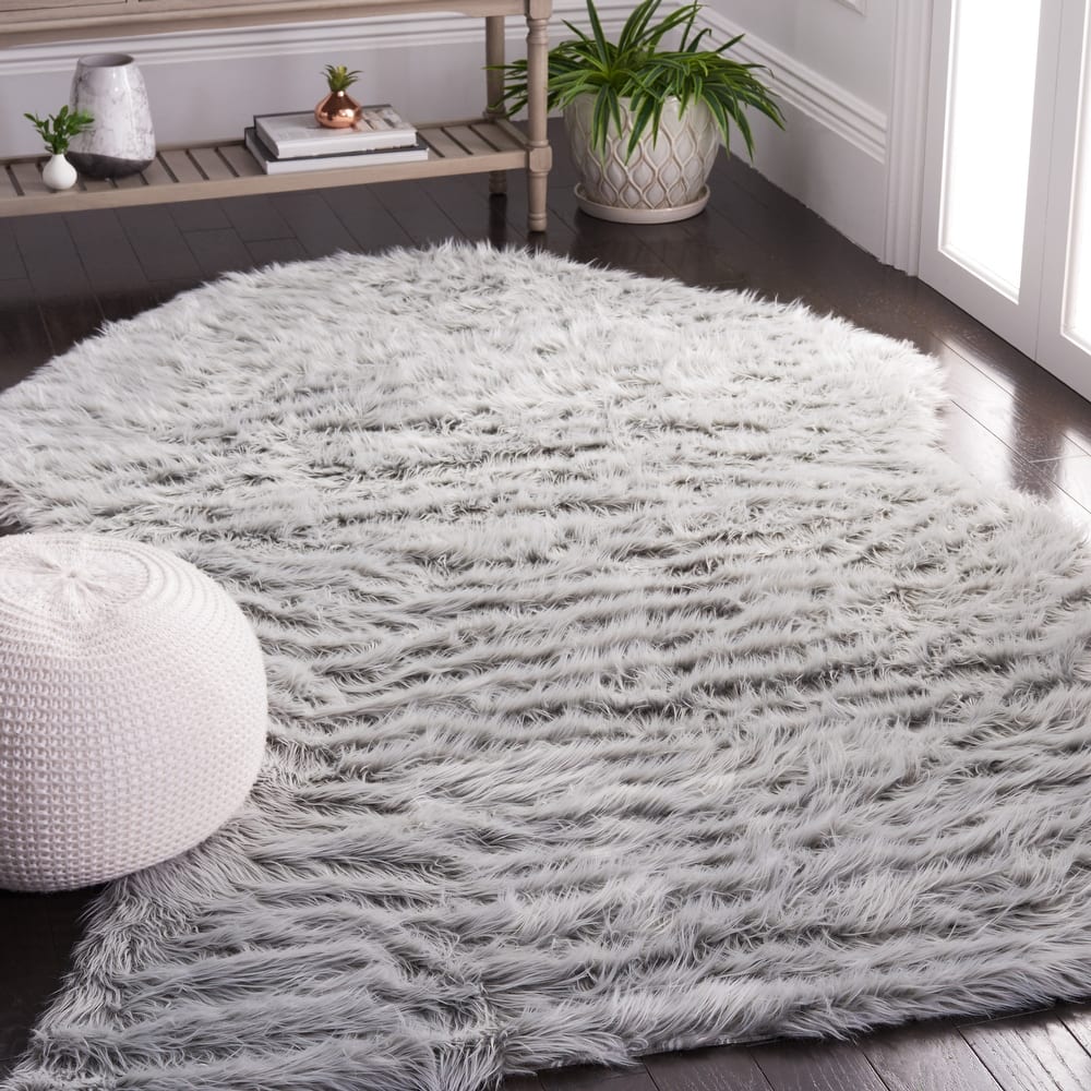 SAFAVIEH Faux Sheep Radena Christen Shag Solid Rug