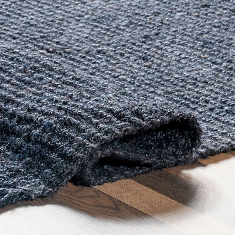 Nuloom Delilah Solid Chunky Jute Tassel Area Rug