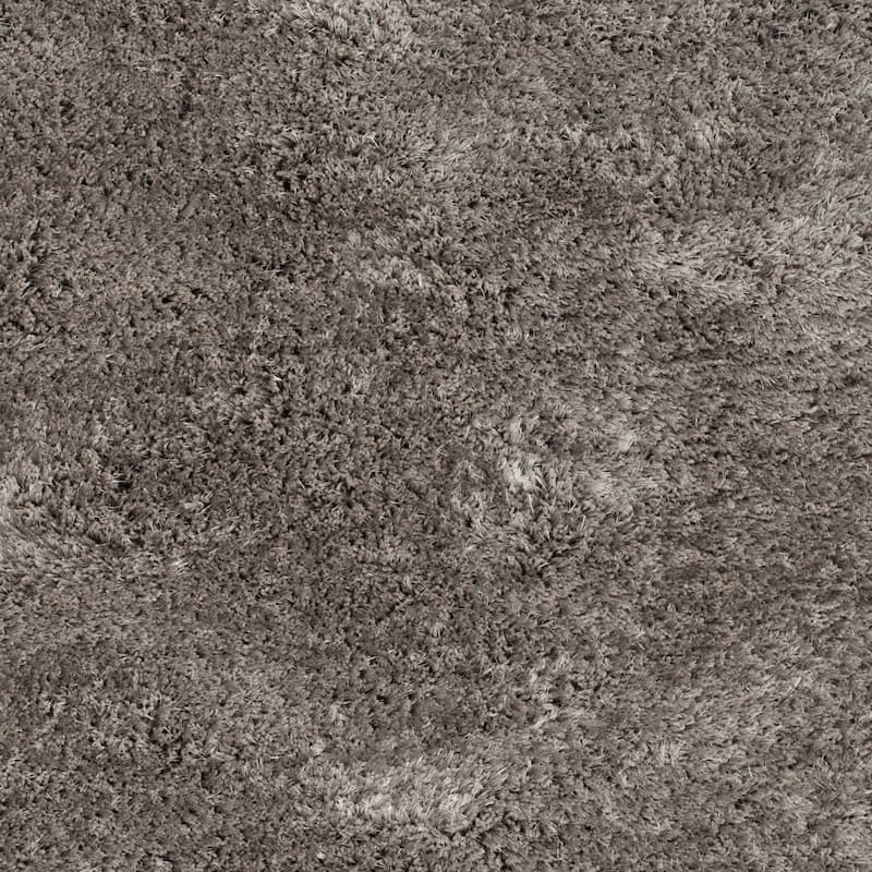 SAFAVIEH Handmade South Beach Leonella Shag Solid Polyester Rug