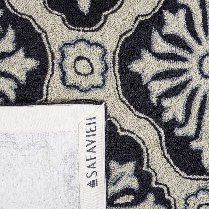 SAFAVIEH Handmade Easy Care Vaxhide Oriental Rug