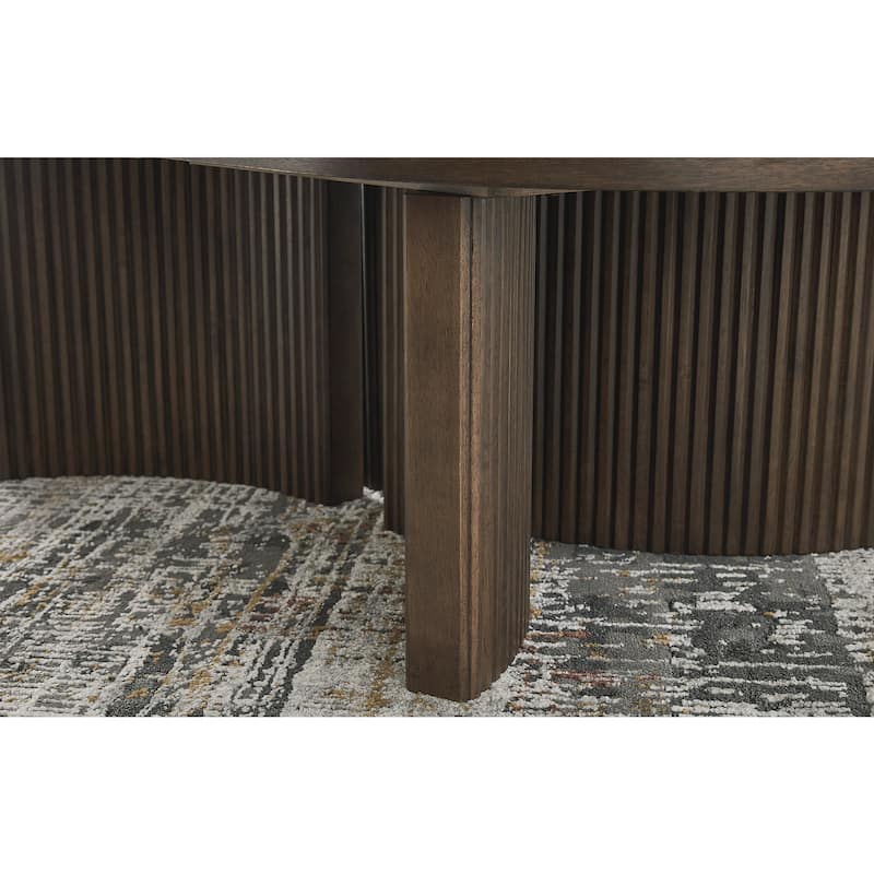 Signature Design by Ashley Korestone Dark Brown Coffee Table - 52"W x 28"D x 17"H