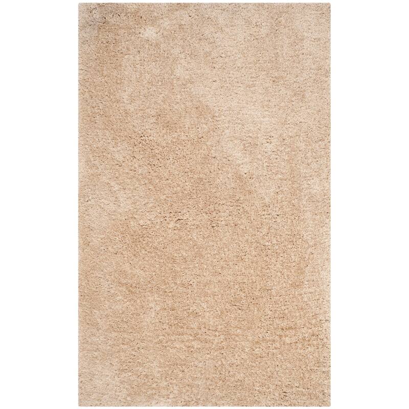 SAFAVIEH Handmade Ryann Shag Anneclaar Solid Polyester Rug