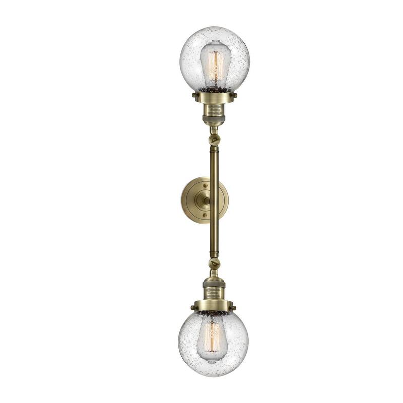 Innovations Lighting Beacon 2 Light 23" Wide Bathroom Vanity Light - Antique Brass / Seedy