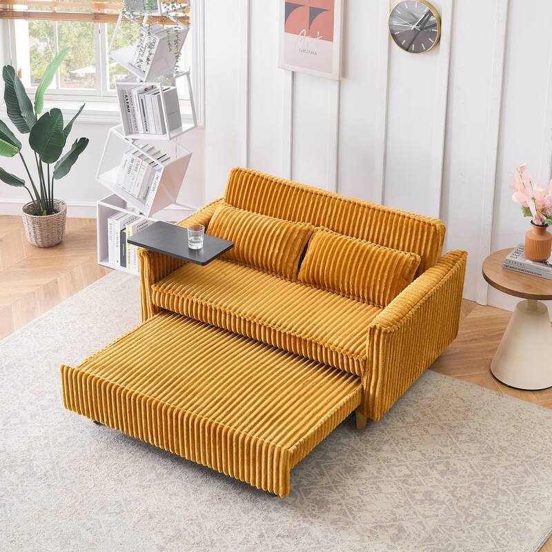 The pull-out and push-in green corduroy sofa with dual functions,equipped with a movable tabletop and USB ports