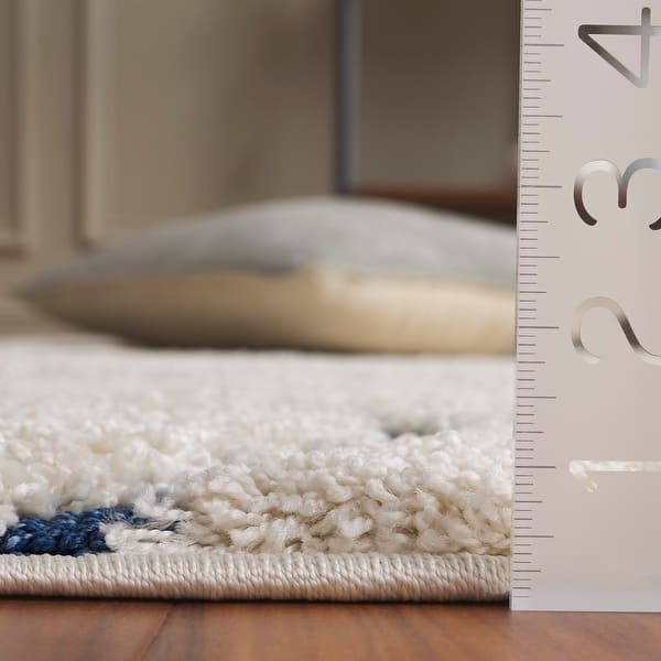 dimension image slide 3 of 4, SAFAVIEH Florida Shag Sigtraud Abstract Waves 1.2-inch Thick Rug