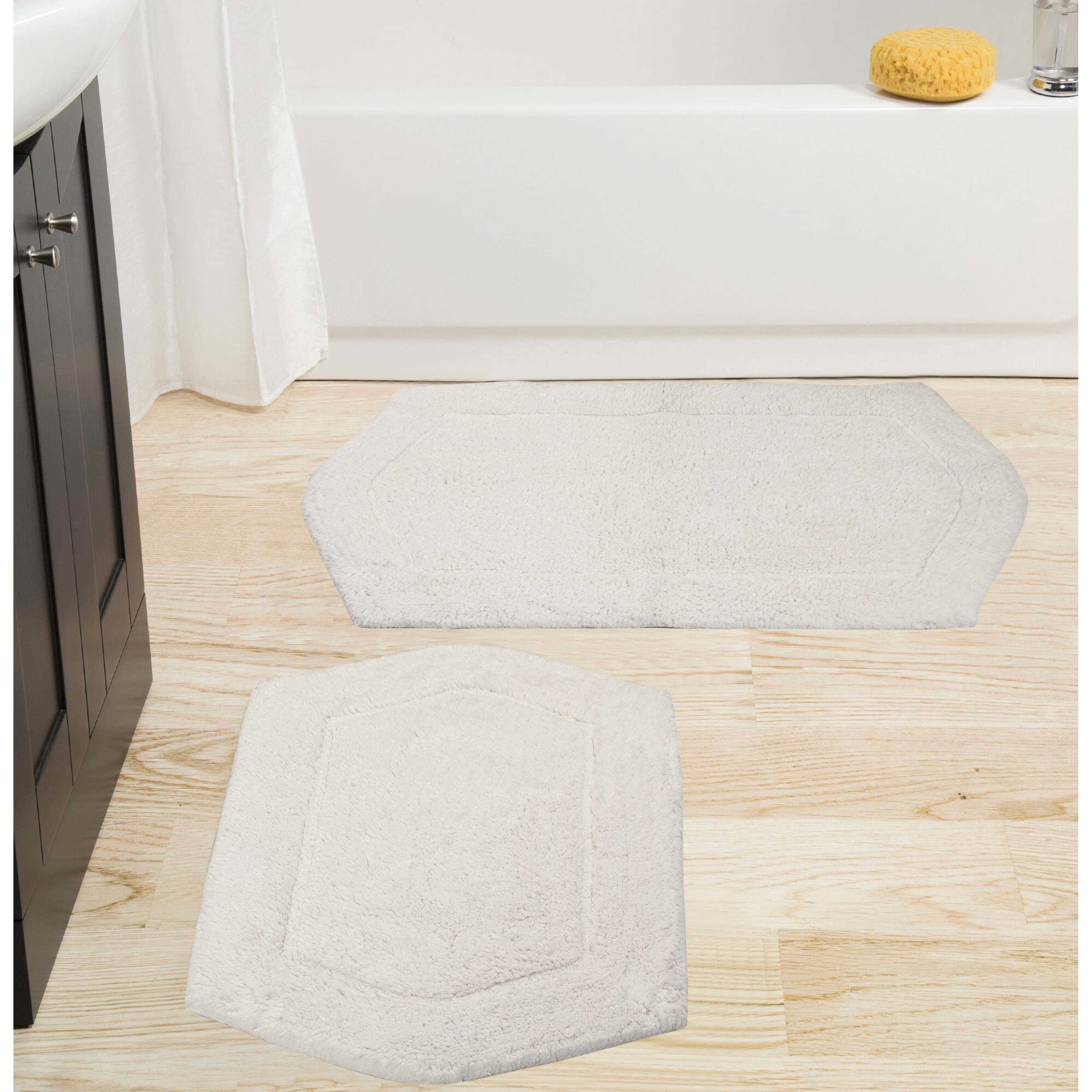 https://ak1.ostkcdn.com/images/products/is/images/direct/1c0c6aec302d2ee339b93a58729f515f52804bcc/Home-Weavers-Waterford-Collection-Cotton-Bath-Rug-Soft-and-Absorbent-Non-Slip-Bath-Carpet-Washable-2-Piece-Set-17%22x24%22-21%22x34%22.jpg