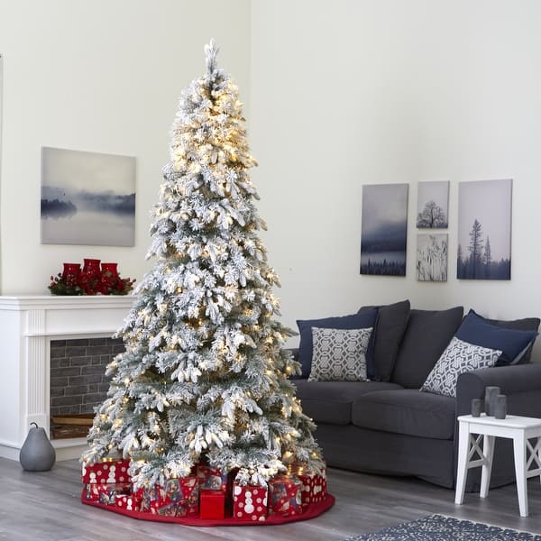 Flocked white Christmas tree with all white and silver decorations