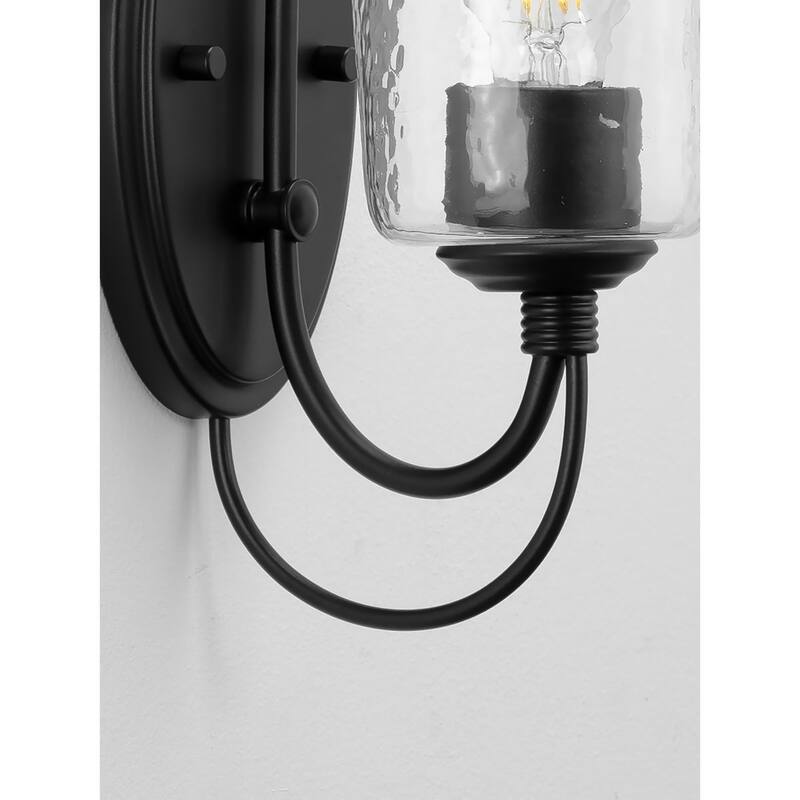 Bowman Collection 1-Light Matte Black Clear Chiseled Glass Coastal Bath Vanity Light