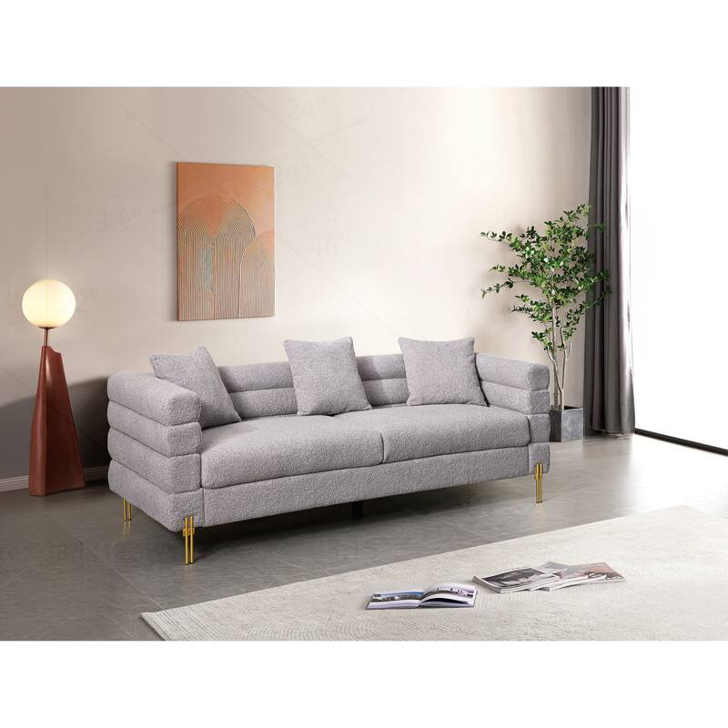 Comfortable Upholstered Sofa with Stylish Golden Legs and Soft Pillows for Living Room